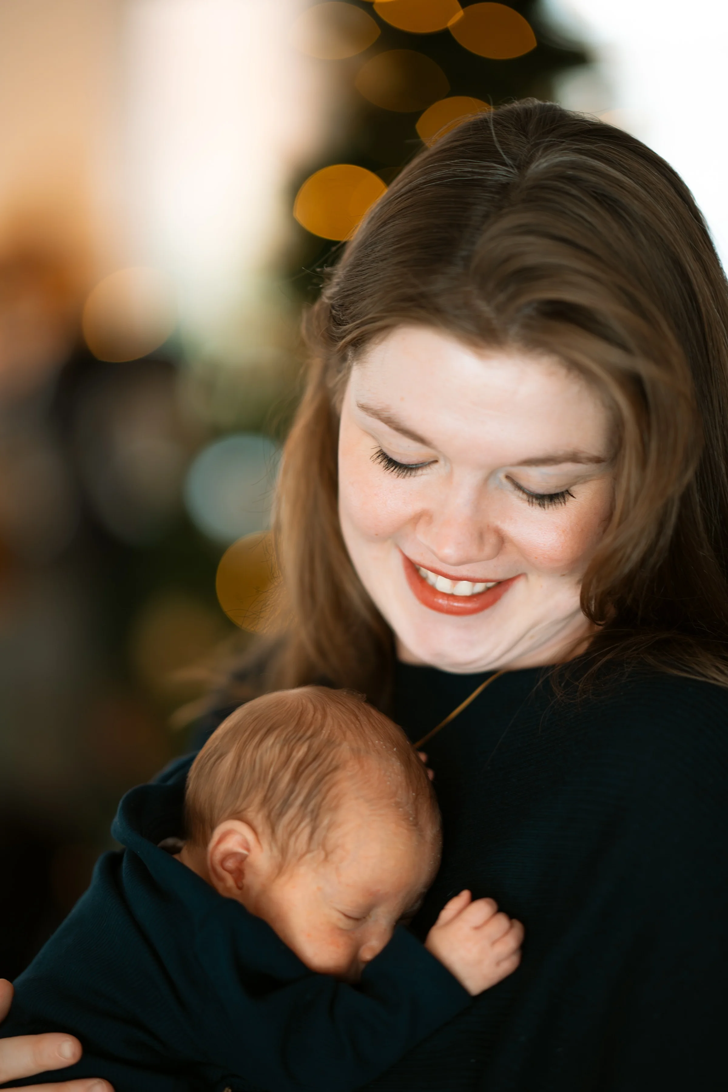 A mother holding her newborn