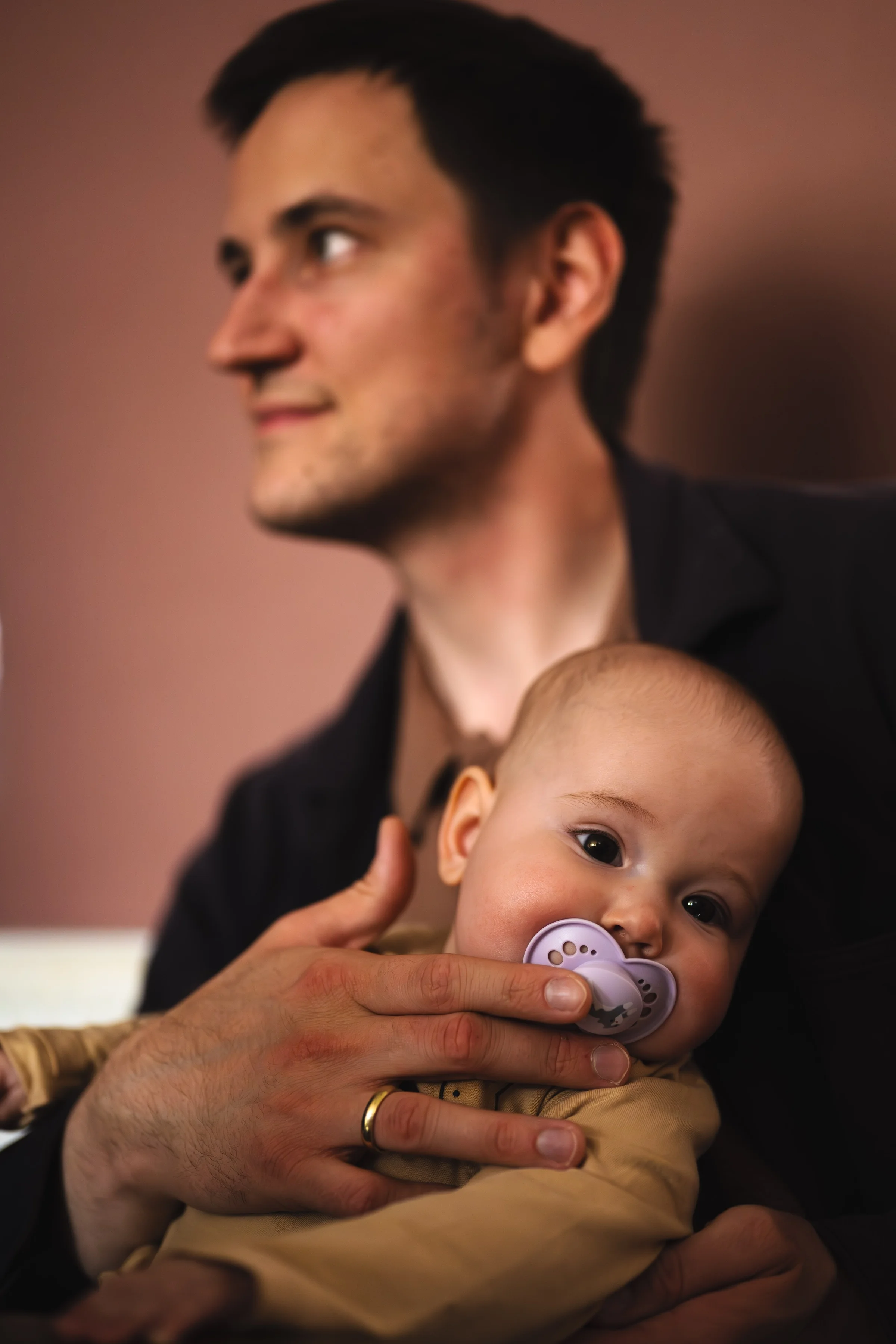 A father holding his baby